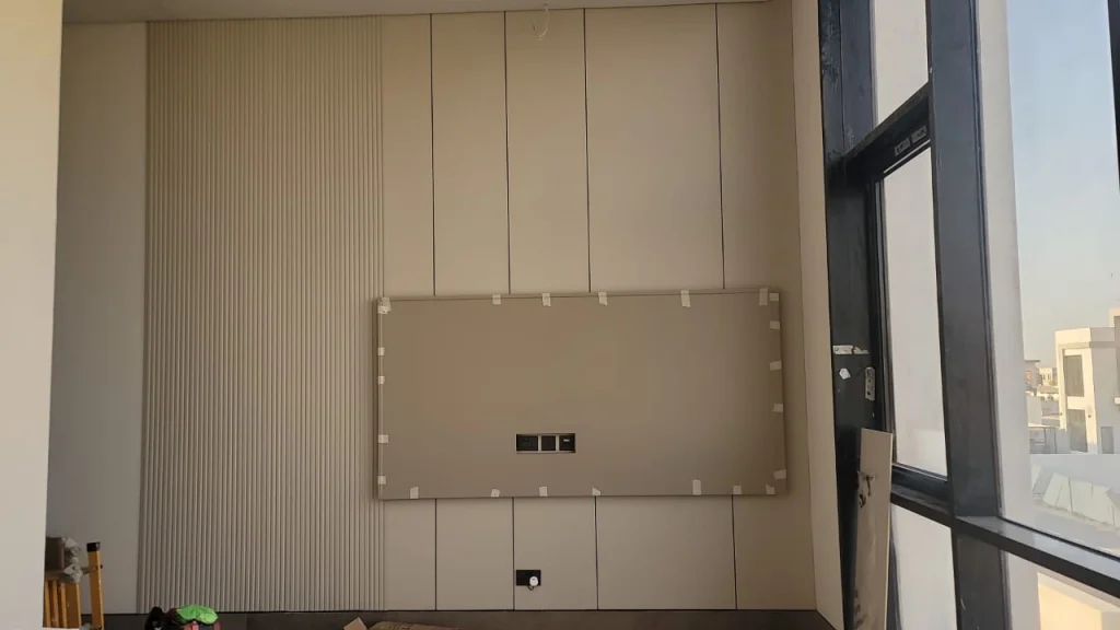 Professional full wall panel installation in Dubai Hills Business Park, Building 2.